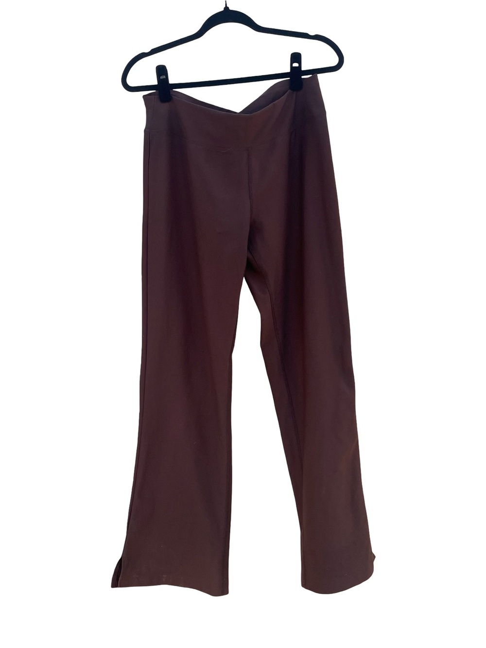 Lucy yoga pants featuring a flared leg and side split hems medium